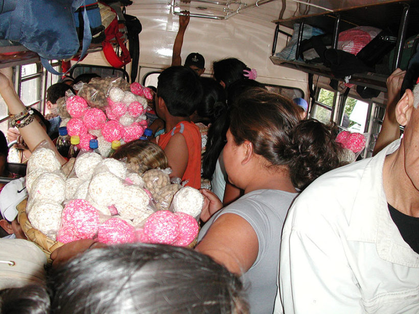 Crowded buses in Guatemala.